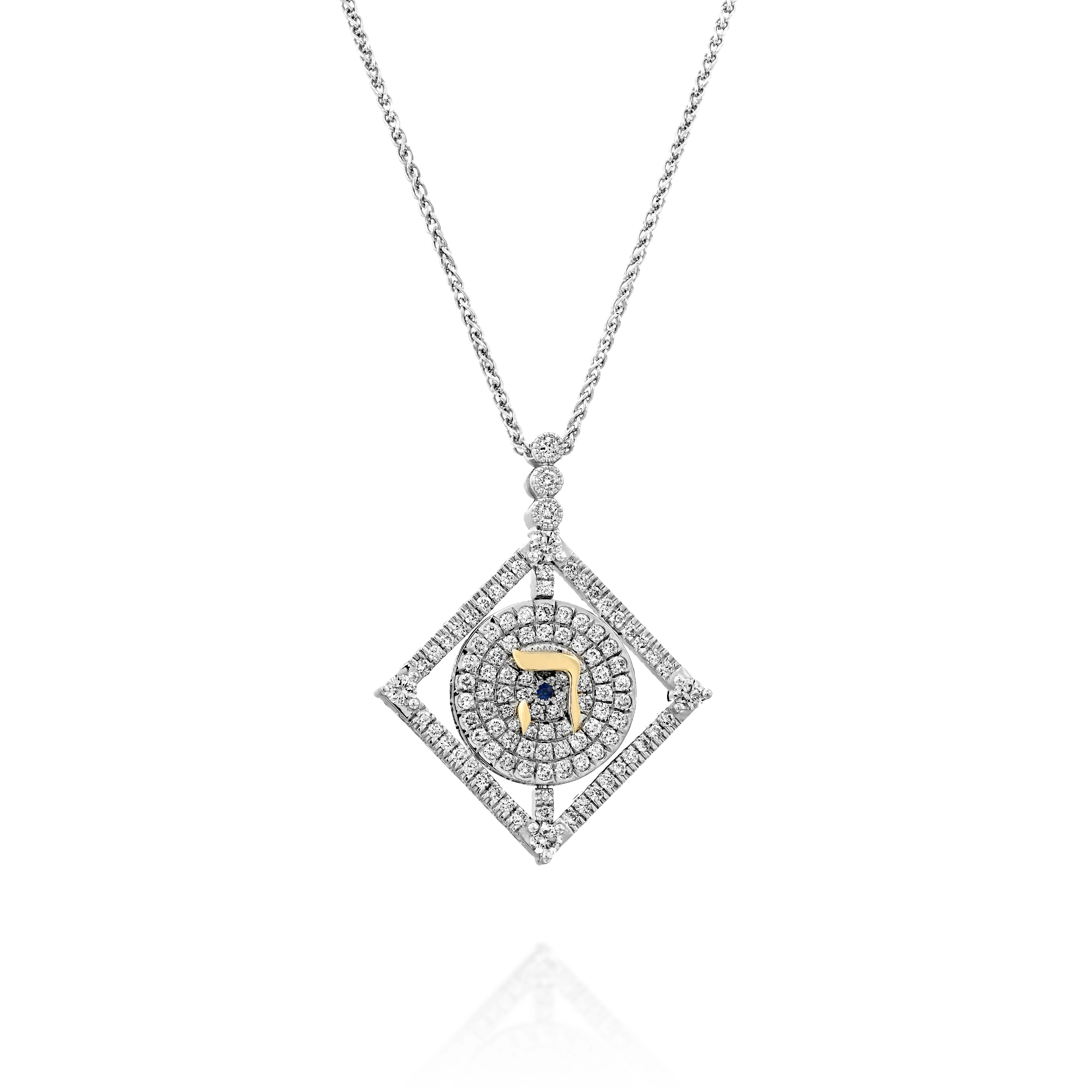 A circular rotating plate hangs gently within a platinum double-sided square pendant set with round brilliant diamonds.